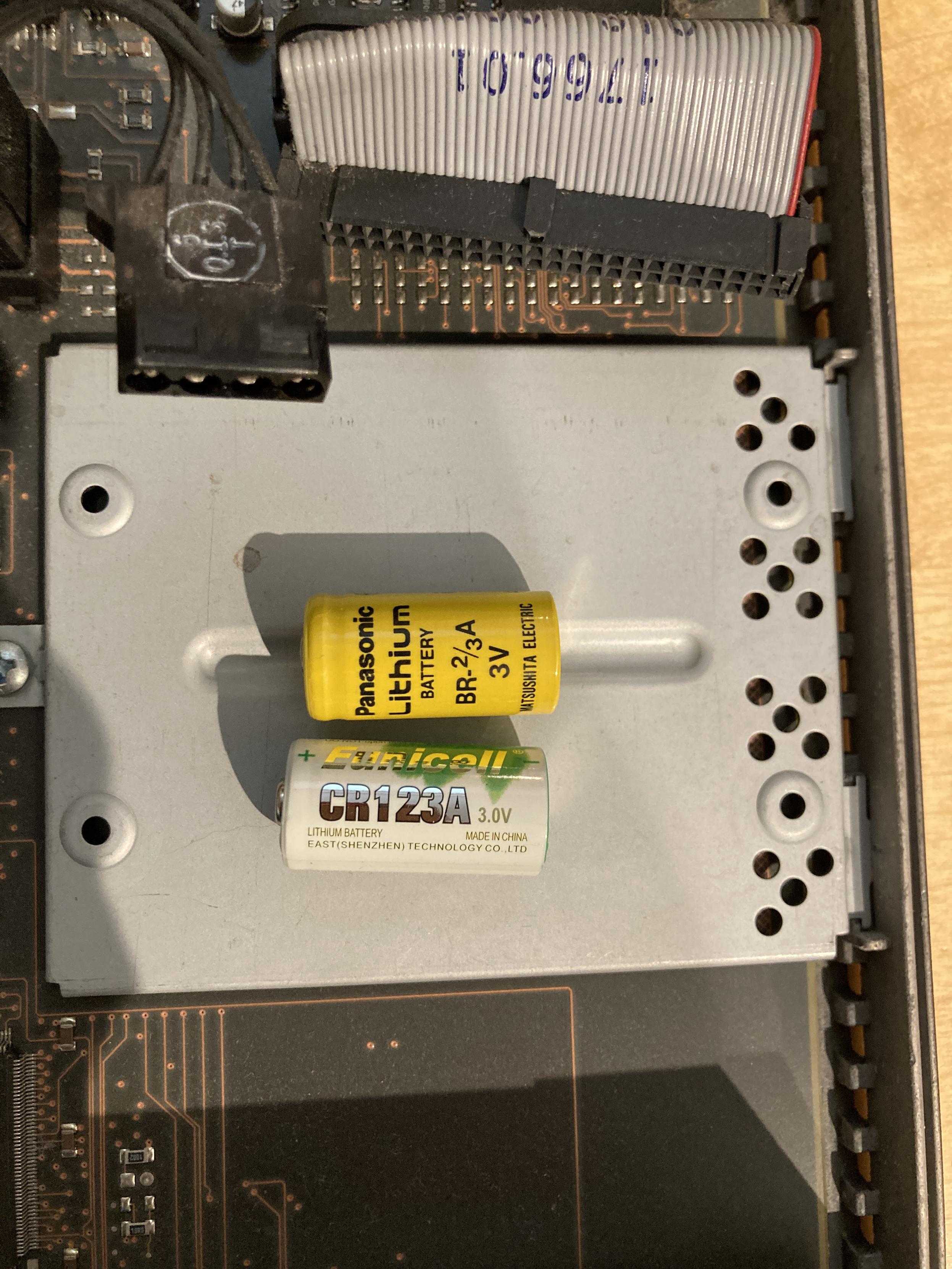 A side-by-side comparison of a Panasonic Lithium BR-2/3A and generic CR123A battery. Both show the same voltage and dimensions.