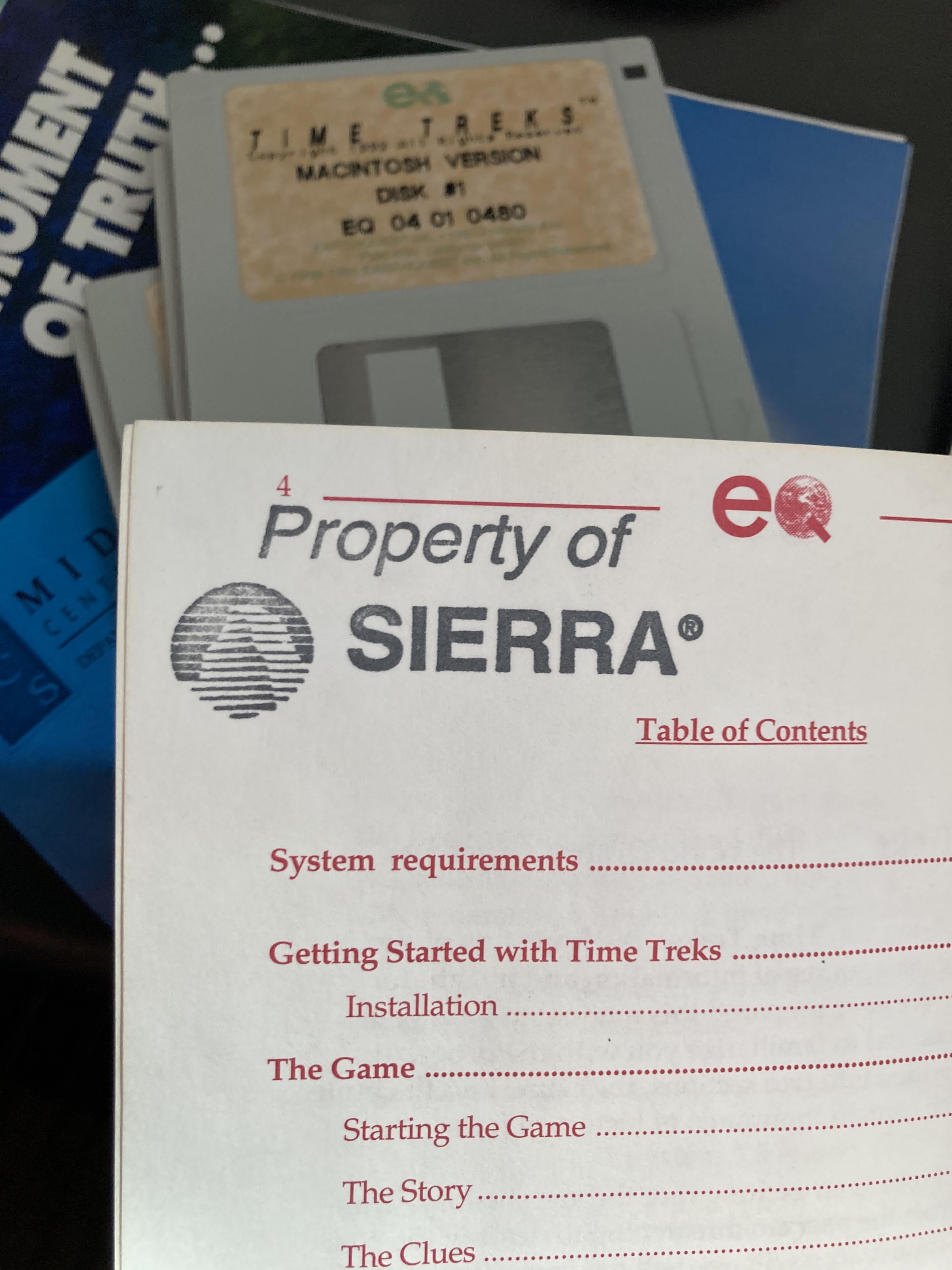 The manual for Time Treks. Someone has used a black stamp that reads Property of SIERRA, with the Half Dome logo beside it.